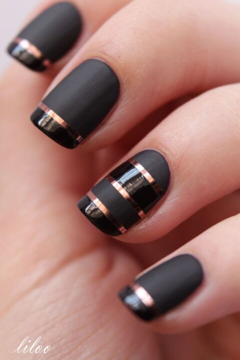 Dashing black matte nails with elegant design picsmine.
